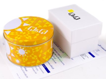 Zdjęcie pudełka i gwarancji Q&Q